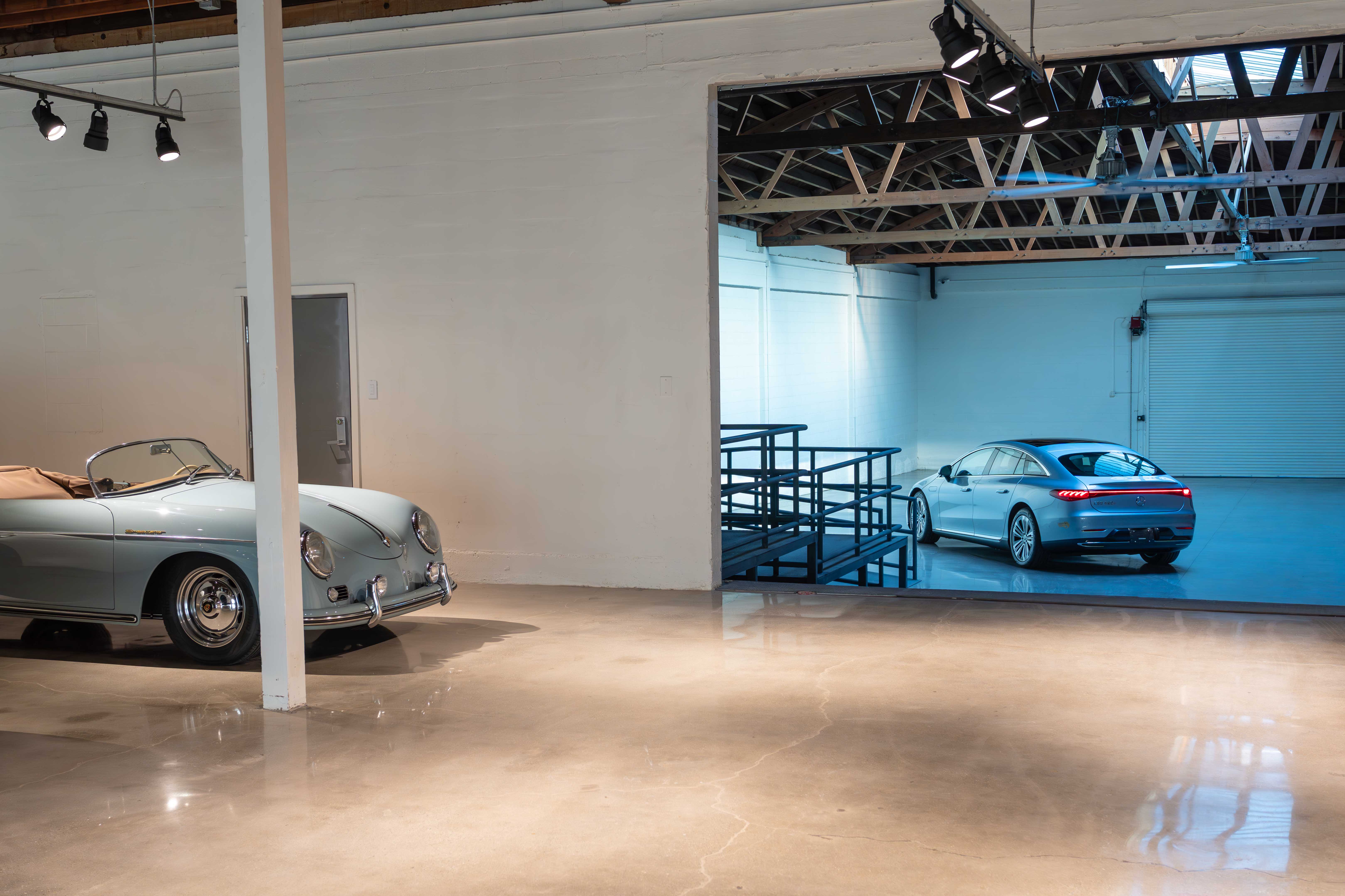 Showroom featuring classic and modern vehicles